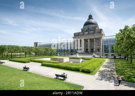 MUNICH, GERMANY, JUNE 4: Tourists at Hofgarten park in Munich, Germany on June 4, 2014. The public renaissance garden was created in the 17th Stock Photo