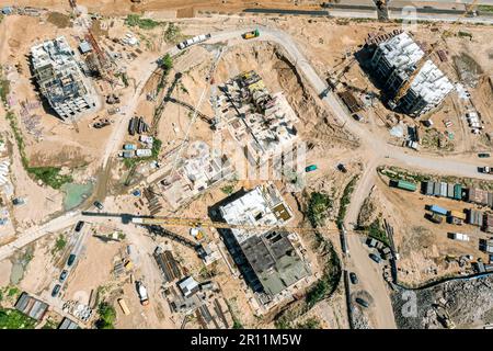 building concrete slab foundation on the construction site. aerial drone photo looking down. Stock Photo
