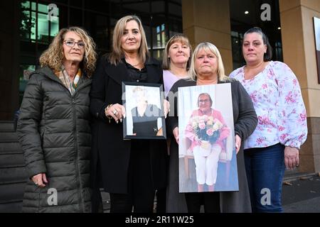 l r sisters joyce burn and joan miranda holding a picture of their mother stella galea sisters danielle skinner and ann marie jeal holding a picture of their mother olga boyle and connie tropea pose for a photograph outside of the melbourne magistrates court in melbourne thursday may 11 2023 aged care home heritage care ltd has been charged by worksafe with breaching health and safety regulations by allegedly failing to properly train staff at epping gardens between march 13 and july 2020 during a covid 19 outbreak which led to deaths and infections aap imagediego fedele no 2r11w25