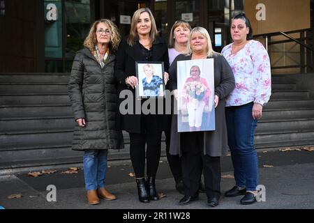 l r sisters joyce burn and joan miranda holding a picture of their mother stella galea sisters danielle skinner and ann marie jeal holding a picture of their mother olga boyle and connie tropea pose for a photograph outside of the melbourne magistrates court in melbourne thursday may 11 2023 aged care home heritage care ltd has been charged by worksafe with breaching health and safety regulations by allegedly failing to properly train staff at epping gardens between march 13 and july 2020 during a covid 19 outbreak which led to deaths and infections aap imagediego fedele no 2r11w28