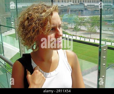 New York, USA - June 06, 2006: young woman at ground zero monument Stock Photo