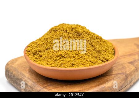 Cumin powder isolated on white background. Cumin powder on wood flipchart. Spice concept Stock Photo