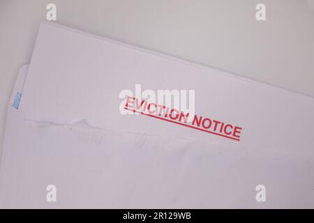 Eviction notice in opened envelope Stock Photo