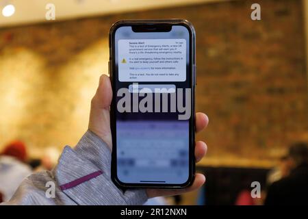 A boardcast message is sent to phones across the country by the UK government as a test of emergency alerts.   Image shot on 23rd Apr 2023.  © Belinda Stock Photo