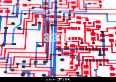 close up of a plotted circuit layout in red and blue for a printed board Stock Photo