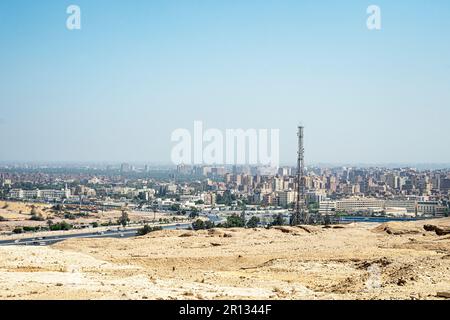 a modern suburb of Cairo, Giza. arab city, chaotic development. View Over Smoggy Slums Of Cairo. look over Cairo with its traditional egyptian buildin Stock Photo