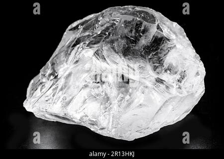 rough diamond, crystal in an allotropic form of carbon, uncut gemstone, concept of luxury or wealth Stock Photo