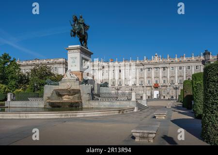 Plaza de Oriente Square with Monument to Philip IV (Felipe IV) and Royal Palace of Madrid - Madrid, Spain Stock Photo