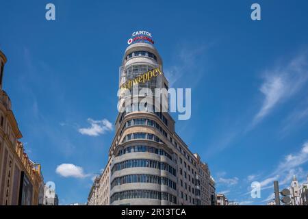 Edificio Capitol (or Carrion) Building with famous Schweppes sign at Gran Via Street - Madrid, Spain Stock Photo