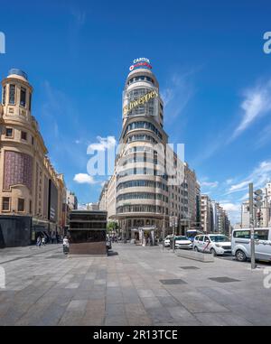Edificio Capitol (or Carrion) Building at Gran Via Street and Plaza Callao Square - Madrid, Spain Stock Photo