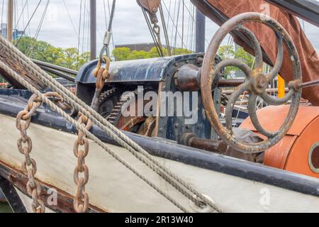 Netherlands. Vintage mechanical winch on a very old ship in Amsterdam Stock Photo