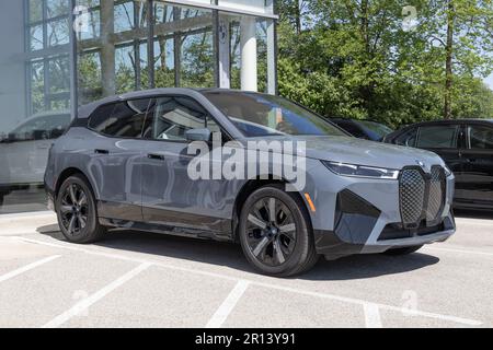 Indianapolis - Circa May 2023: BMW iX xDrive50 EV Electric Vehicle display at a dealership. BMW offers the iX xDrive50 with up to 300 miles of range. Stock Photo