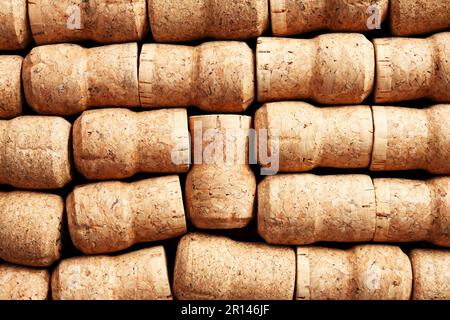 Many corks of wine bottles as background, top view Stock Photo