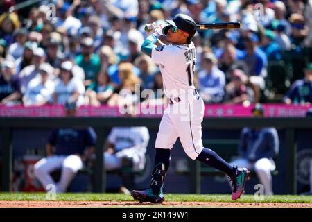 Seattle Mariners' Kolten Wong follows through during a baseball game  against the Washington Nationals, Tuesday, June 27, 2023, in Seattle. (AP  Photo/Lindsey Wasson Stock Photo - Alamy