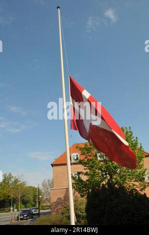 Kastrup/Copenhagen /Denmark/11  May 2023/Danish flag at hal mast due death of church meber  congigation in Kastrup Church in Kastrup.(Photo.Francis Joseph Dean/Dean Pictures) Stock Photo