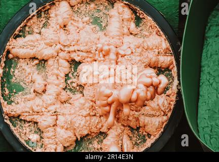 Spraying foam texture. Polyurethane foam close up. Stock Photo