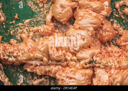Spraying foam texture. Polyurethane foam close up. Stock Photo