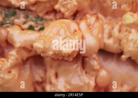 Spraying foam texture. Polyurethane foam close up. Stock Photo