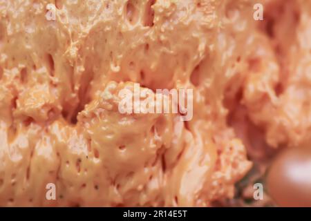 Spraying foam texture. Polyurethane foam close up. Stock Photo