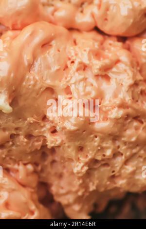 Spraying foam texture. Polyurethane foam close up. Stock Photo