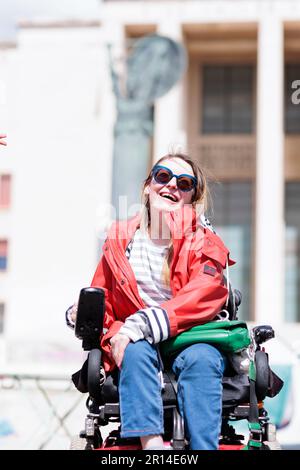 Unity in Protest: Students of Sapienza University in Rome share a moment of camaraderie in their encampment during a protest against rising rental. Stock Photo