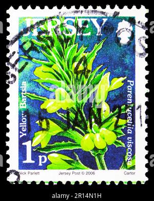 MOSCOW, RUSSIA - APRIL 08, 2023: Postage stamp printed in Jersey shows Yellow Bartsia (Parentucellia viscosa), Wild Flowers serie, circa 2006 Stock Photo