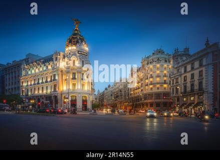 Calle de Alcala and Gran Via Streets at night with Edificio Metropolis Building - Madrid, Spain Stock Photo
