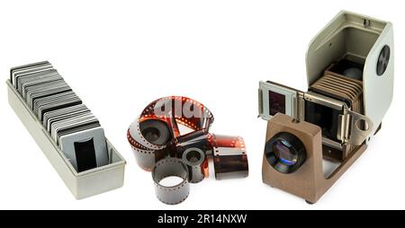 Slide projector, slides and photographic film isolated on white background. Collage. Stock Photo