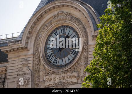 Clock on the facade of the current Musee d'Orsay of Paris, formerly the Orsay train station Stock Photo