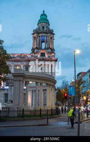 One of the towers of Belfast City Hall at dusk on Donegall Square, Belfast, Northern Ireland, UK Stock Photo