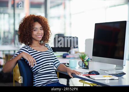 Developing tomorrows tech today. a designer at their workstation in an office. Stock Photo