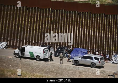 Tijuana, Mexico. 11th May, 2023. Migrants stuck between the primary and secondary fencing at the Tijuana-San Diego border for over a week, are waiting and hoping to be allowed to immigrate to the U.S. more easily after the 'Title-42' deportation order expires on May 11, as seen from Tijuana, Mexico on Thursday, May 11, 2023. Photo by Carlos Moreno/UPI Credit: UPI/Alamy Live News Stock Photo