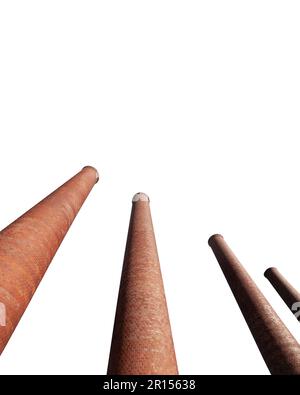 Old brick factory smokestacks isolated with cut out sky. Stock Photo