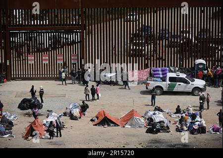 Tijuana, Mexico. 11th May, 2023. Migrants stuck between the primary and secondary fencing at the Tijuana-San Diego border for over a week, wait and hope to be allowed to immigrate to the U.S. more easily after the 'Title-42' deportation order expires on May 11, as seen from Tijuana, Mexico on Thursday, May 11, 2023. Photo by Carlos Moreno/UPI Credit: UPI/Alamy Live News Stock Photo