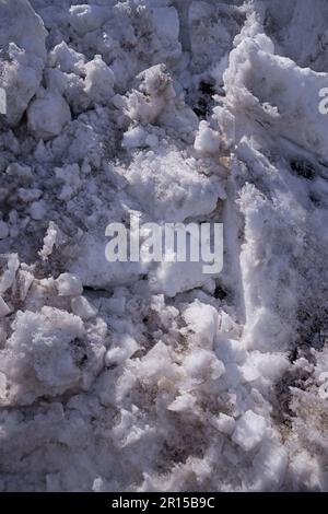 dirty snow on the side of a road Stock Photo