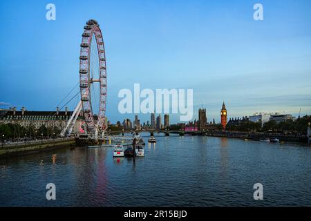 Projections on Big Ben in London to celebrate the Coronation of King Charles III - Light show on Elizabeth Tower and the Houses of Parliament in Westm Stock Photo