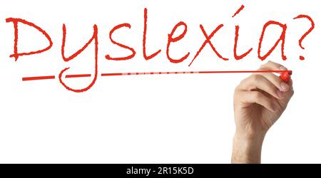 Man writing word Dyslexia on white background, closeup. Banner design Stock Photo