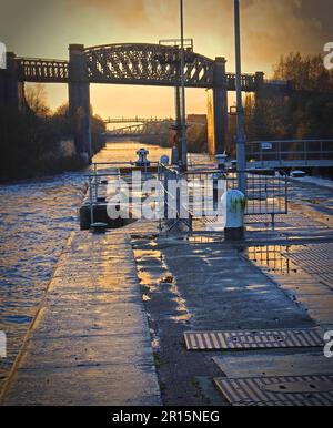 Latchford Locks, disused Cheshire Lines railway bridge, in stormy weather, Warrington, Cheshire, England, UK, , WA4 1NN Stock Photo