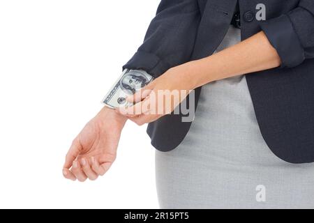 Her bribe is ready. a businesswoman with a 100 dollar bill up her sleeve. Stock Photo