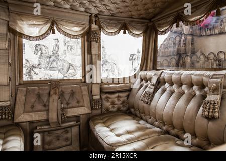 Italy. Old coach on luxury palace background Stock Photo