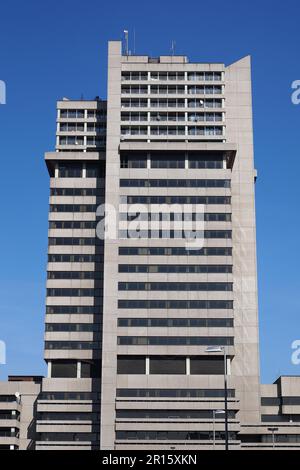 the concrete tower building Hochhaus Lister Tor in Hannover, Germany, is an example for brutalist architecture from the 1970s Stock Photo