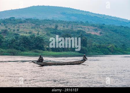 Man on his dugout canoe on the Congo river, Republic of Congo Stock Photo