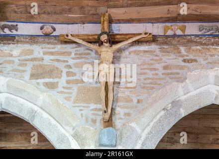 France, Brittany, Pont Aven, The chapel of Tremalo, The Crucifix of Tremalo, Pont-Aven, an anonymous wood sculpture, painted by Paul Gaugin in Stock Photo