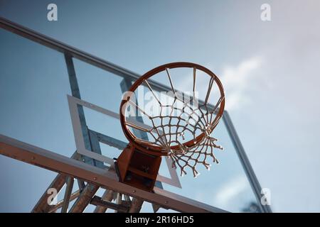 Aiming high. Closeup shot of a basketball hoop on a sports court. Stock Photo