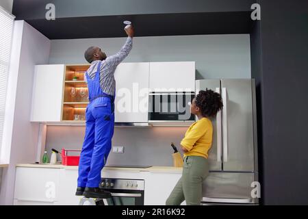 Smoke Fire Alarm Detector Install. Carbon Monoxide Security Stock Photo