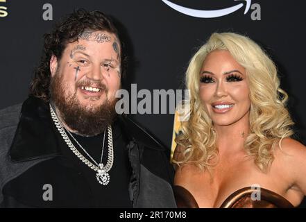 Jelly Roll and Bunnie DeFord arriving at the 2023 CMT Music Awards held