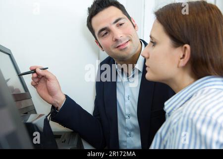 couple shopping for a new 4k uhd television Stock Photo