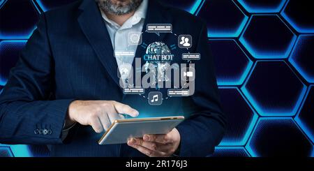 Artificial intelligence, AI chat bot concept. Businessman hands using tablet. ai chatbot infographic Stock Photo