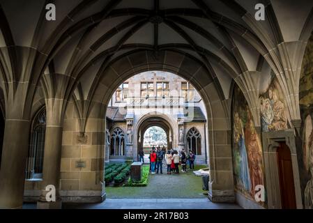 Tourist group in the former cloister of the Fraumunster church, Zurich, Switzerland Stock Photo