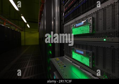 Dresden, Germany. 10th May, 2023. View of the storage systems of the CARA (Computer for Advanced Research in Aerospace) high-performance computer from the German Aerospace Center (DLR). The high-performance computer was installed at the Computing Center of Dresden University of Technology (TU Dresden) and is operated by the Center for Information Services and High Performance Computing (ZIH). The high-performance computer can be used to perform highly accurate and complex simulations that accelerate the introduction of new technologies in aerospace. Credit: Robert Michael/dpa/Alamy Live News Stock Photo